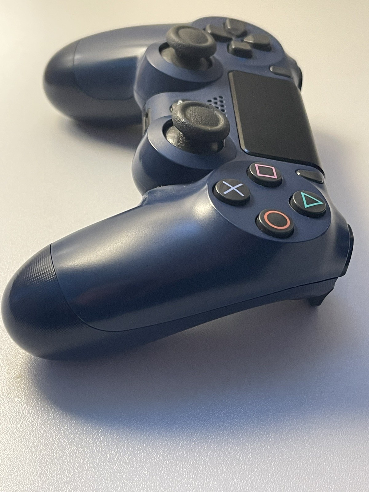 Working PS4 500GB console, w/power cord, PS4 controller, and 5 PS4 games