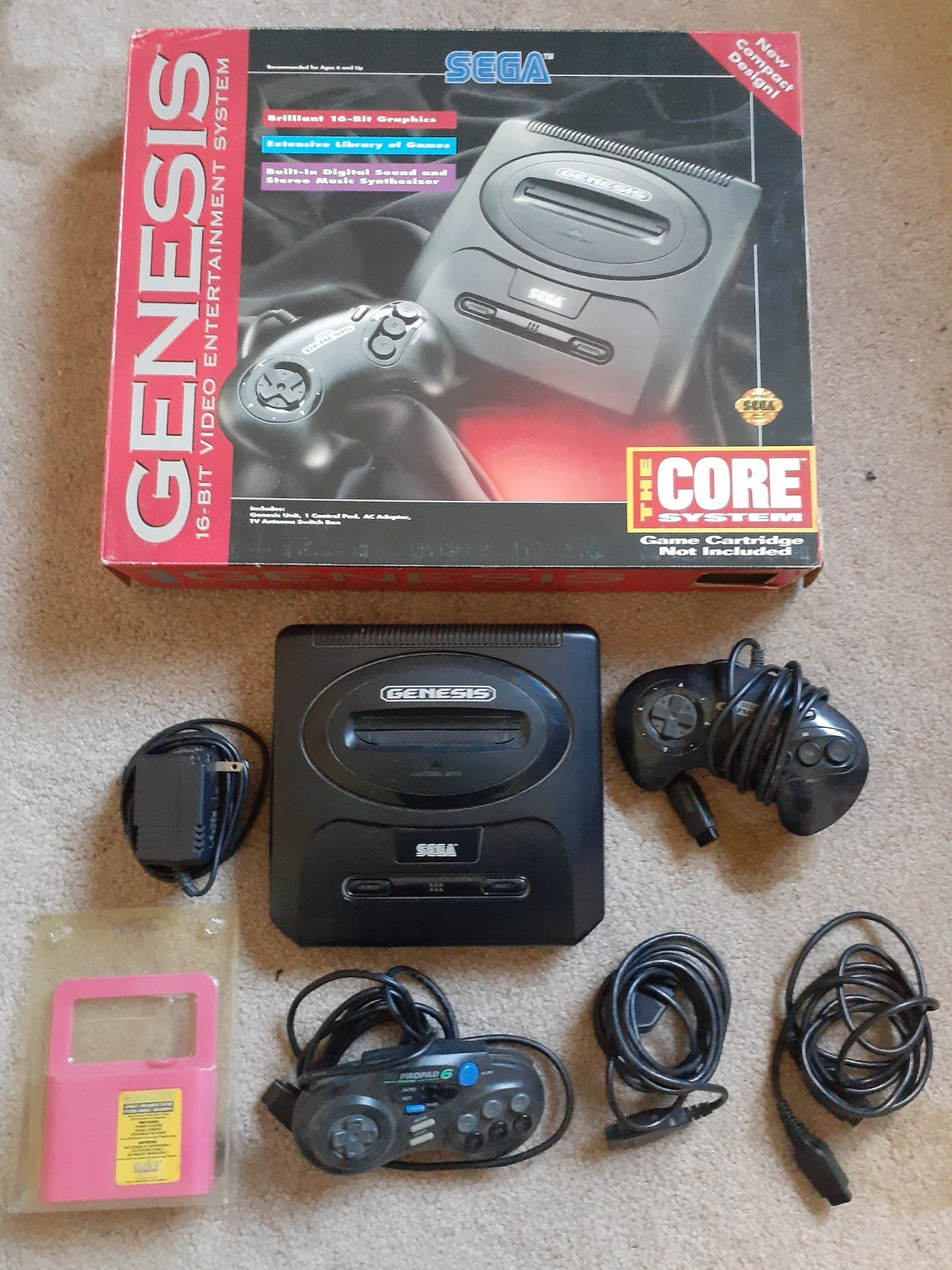 Complete Sega Genesis 16 bit video entertainment system with extra controller