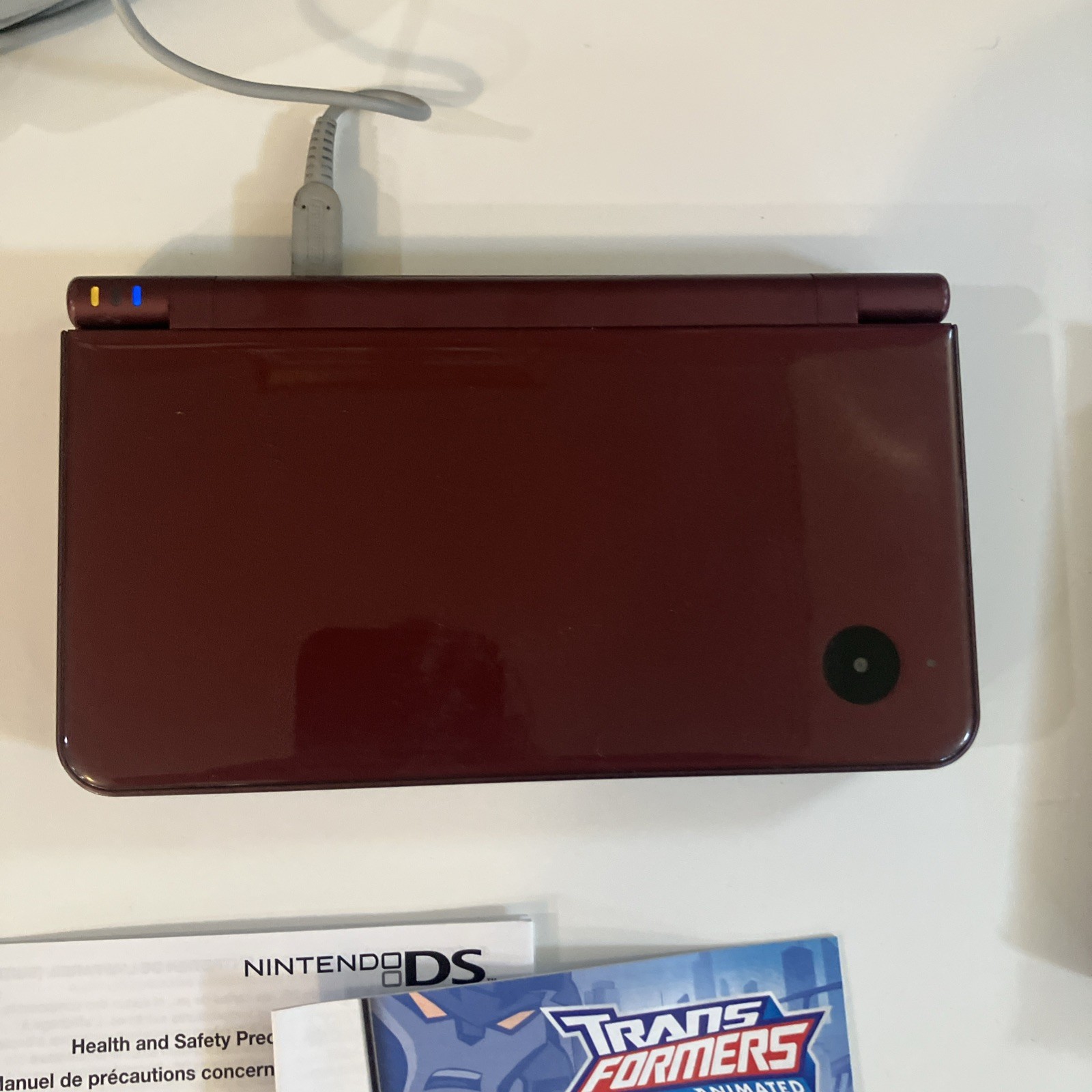 Nintendo DSI XL Handheld console+ Video game transformers +charger red color