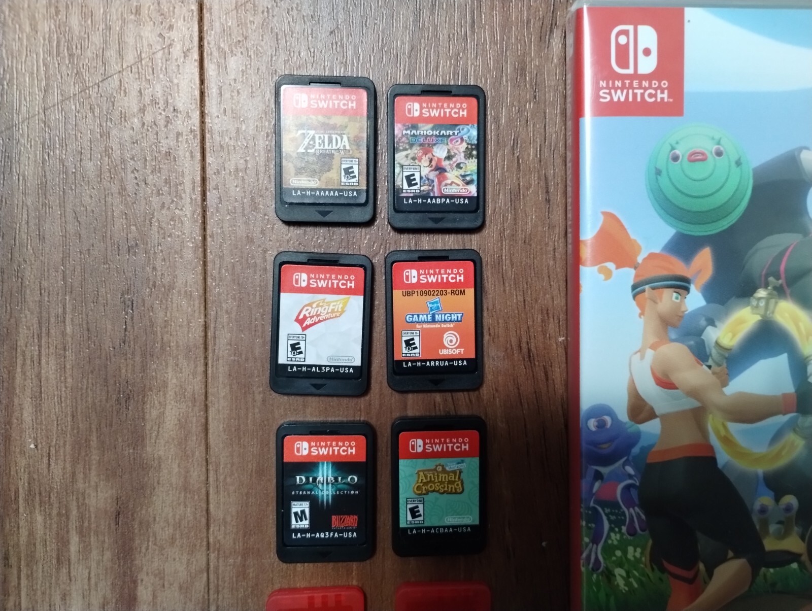 Nintendo Switch Console and games, carrier, Ring Fit, extra controllers
