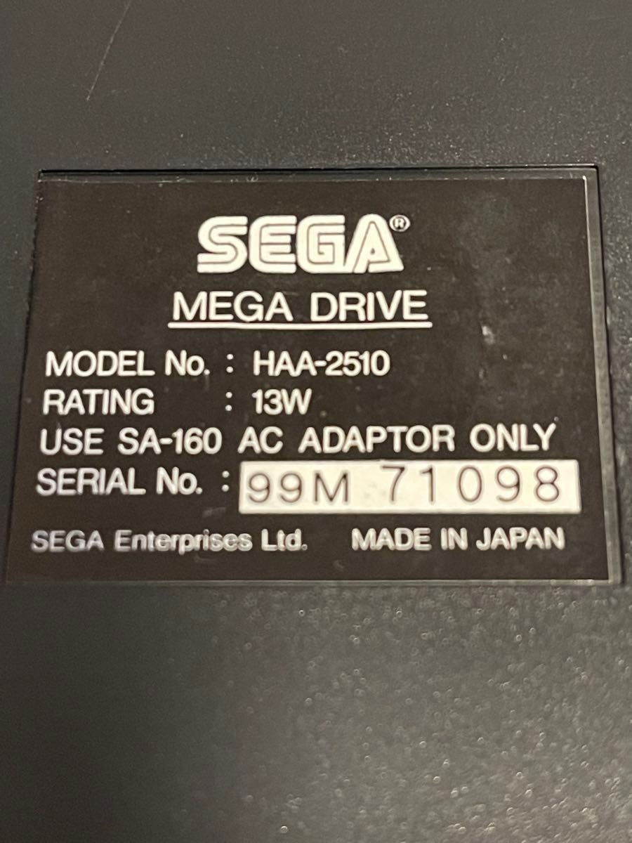 Mega Drive console HAA-2510, working condition, serial number matching.