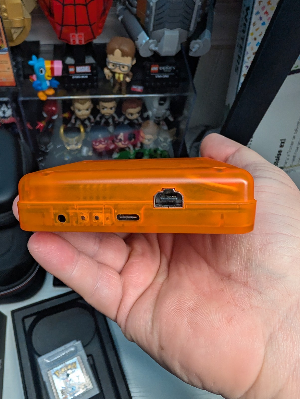 Analogue Pocket Handheld – Transparent Orange Limited Edition w/ pokemon silver
