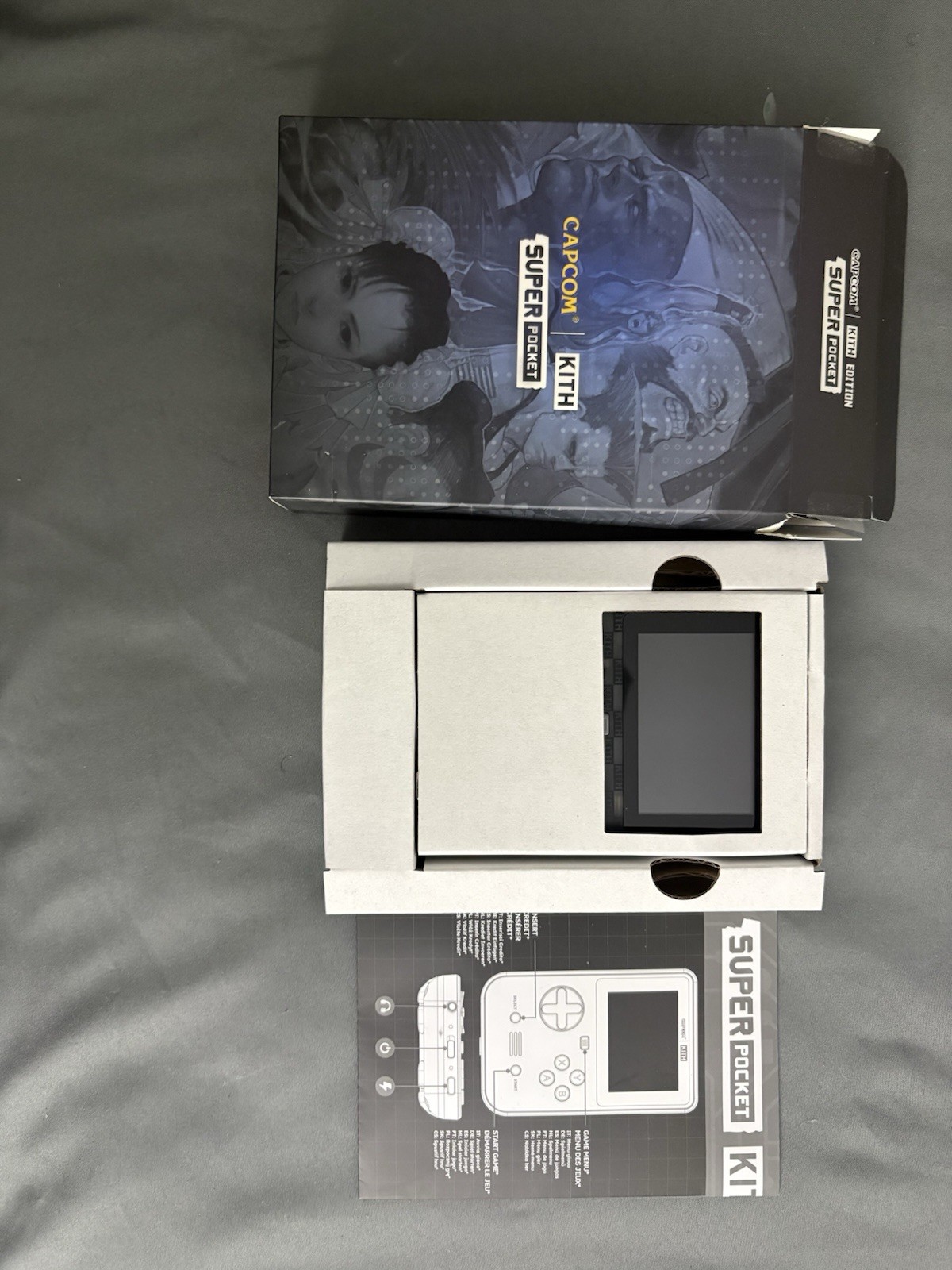 CAPCOM x KITH FOR HYPER MEGA TECH SUPER POCKET HANDHELD CLEAR CONSOLE