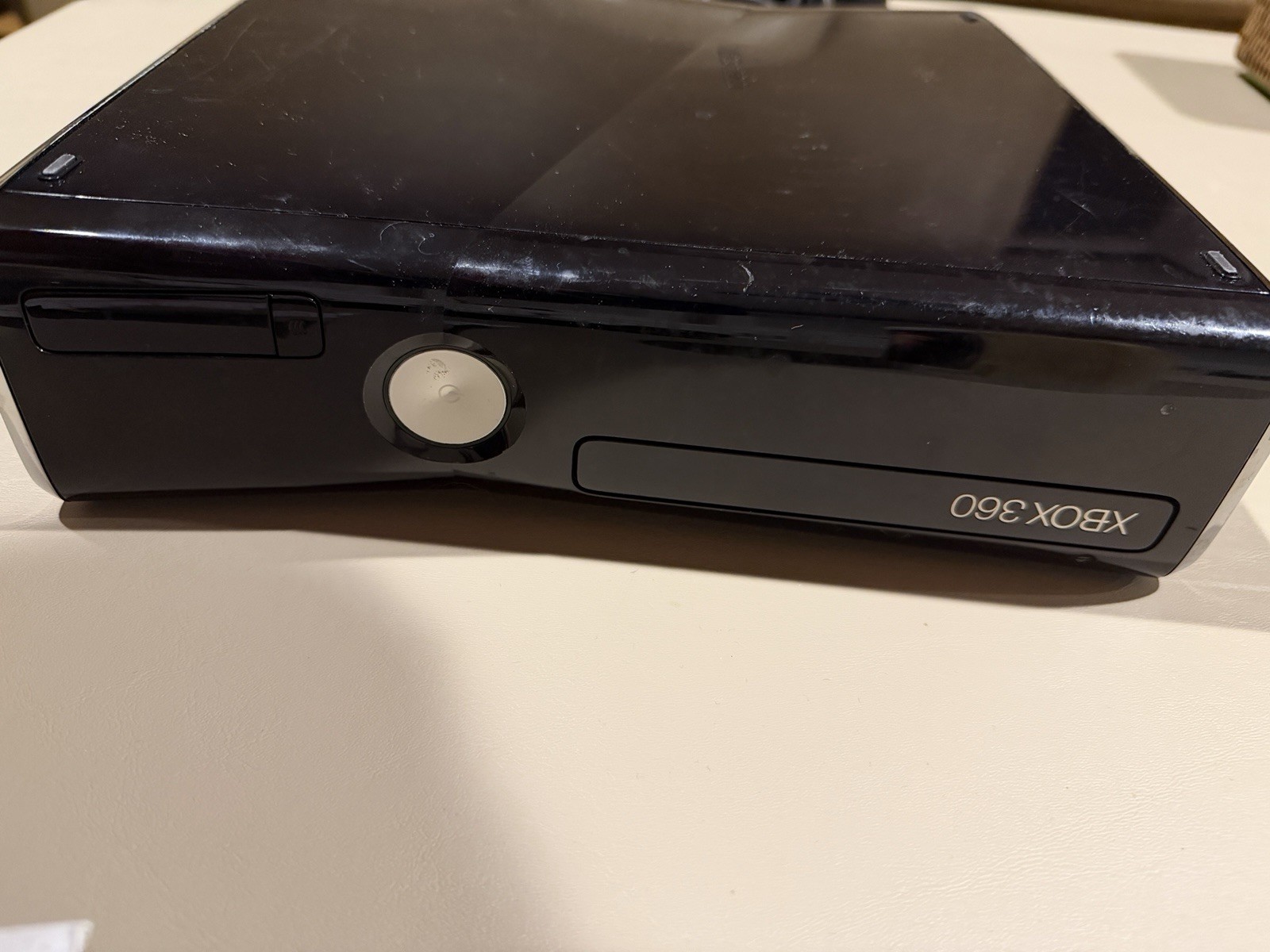 Microsoft Xbox 360 Slim 250GB Black Console, White Controller And Cords(NTSC)