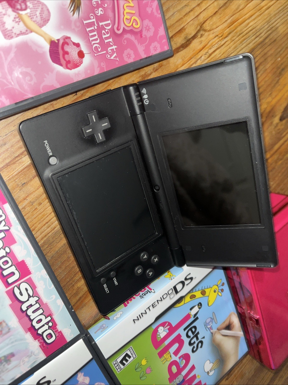 Nintendo DSi (TWL-001) 2008 Black Bundle w/ 5 Games & Carrying Case