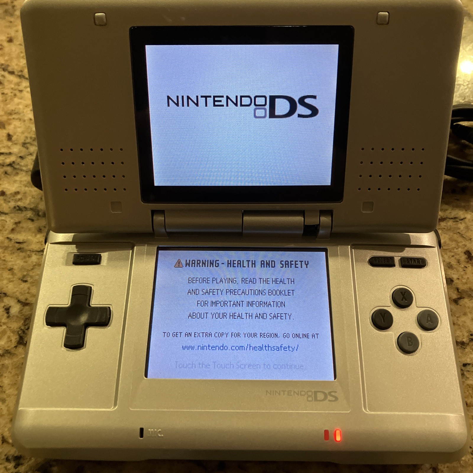 Nintendo DS NTR-001 with Charger Titanium Silver w/ Bad Hinge + 4 games – tested