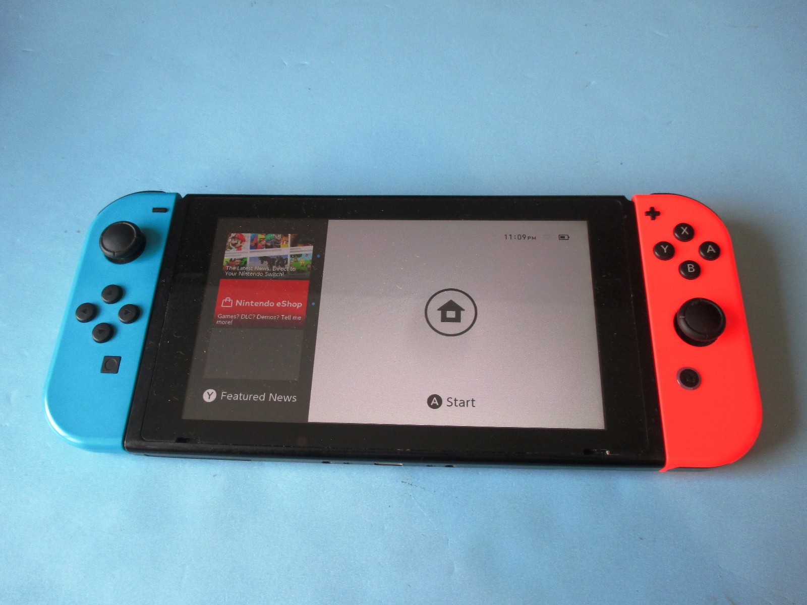 Nintendo Switch System Console w/Neon Red & Blue Joy-Cons + Dock & Extras
