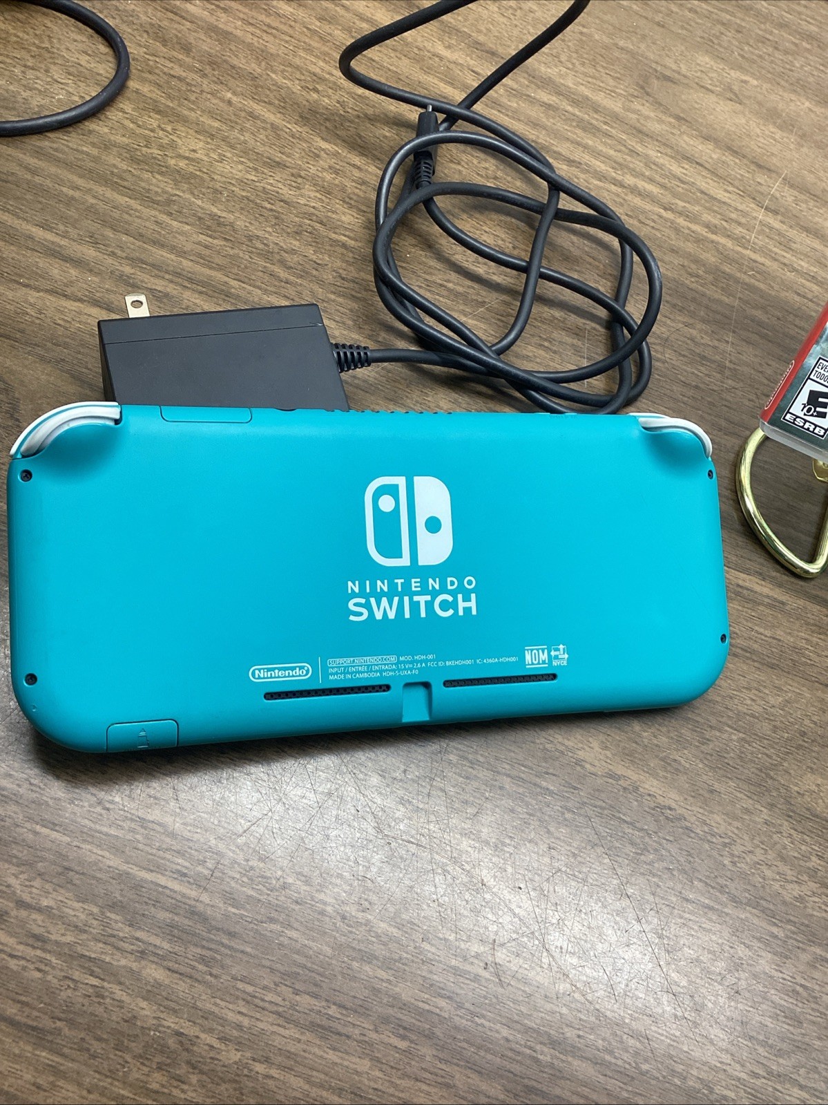 Nintendo Switch Lite Turquoise Teal Handheld Console Bundle with Zelda Game