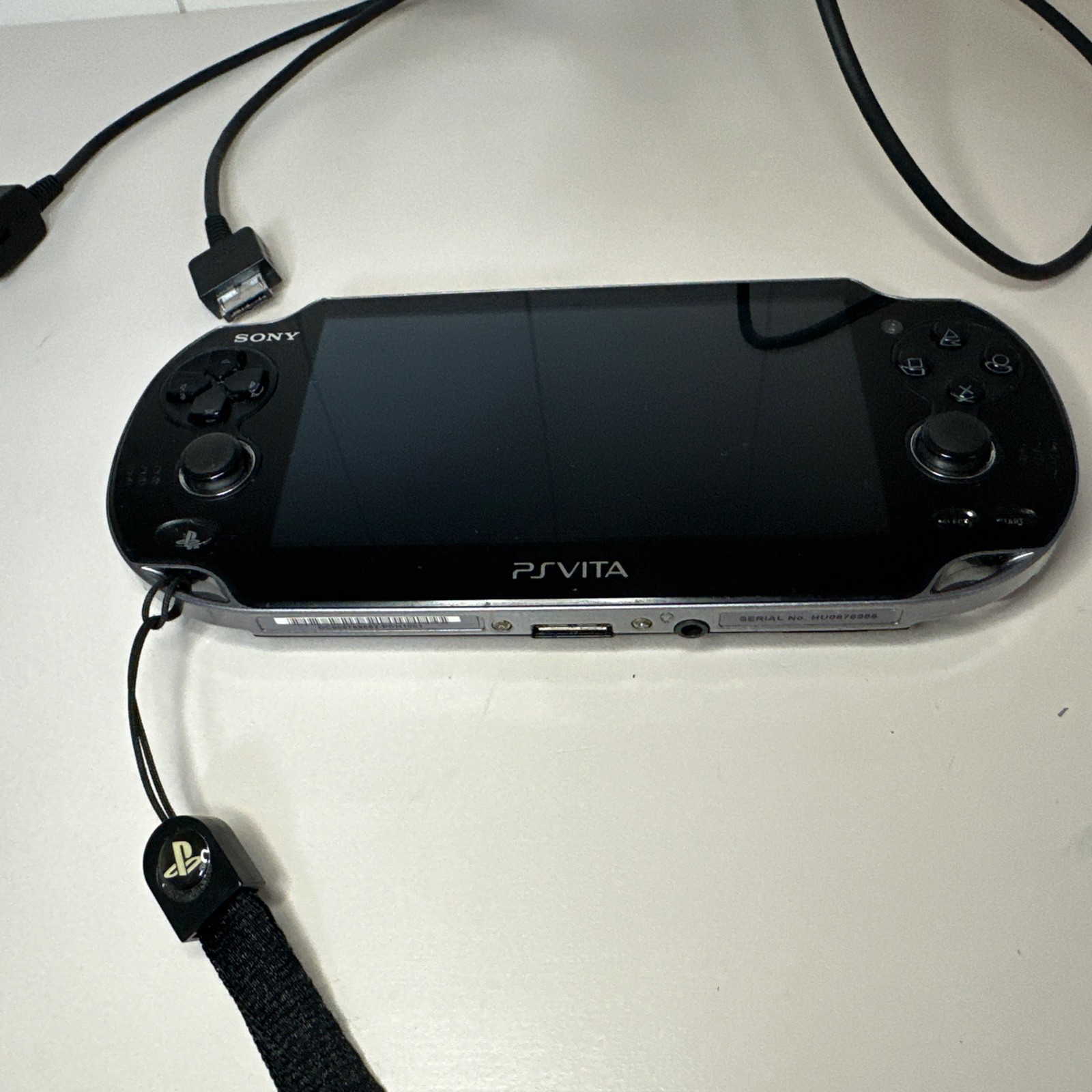 Sony PS Vita PCH-1101 Limited Edition Handheld System – Crystal Black With Game.