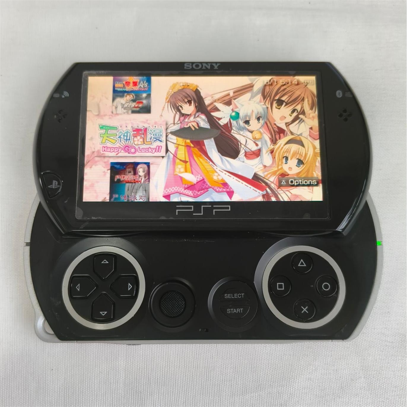 Sony PSP GO console Black with Charger PSP-N1003 Screen with protect