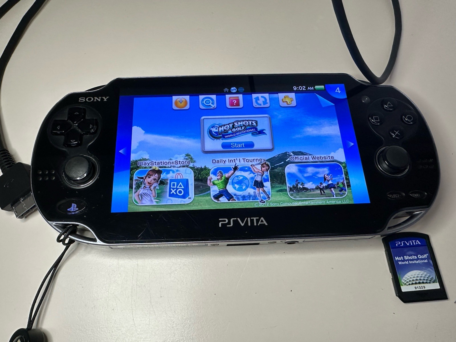 Sony PS Vita PCH-1101 Limited Edition Handheld System – Crystal Black With Game.