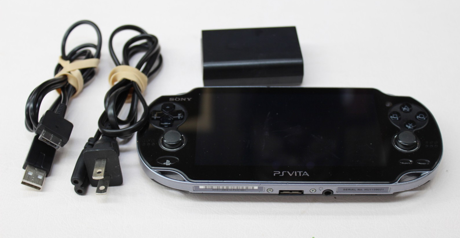 Sony PS Vita PCH-1001 Black Handheld System w/ Charger & 4GB SD Card
