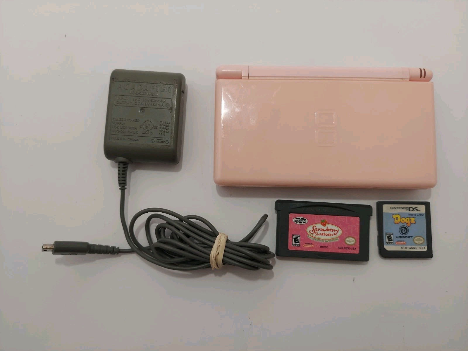 Nintendo DS Lite Console – Coral Pink With Charger, Stylus, And Games – TESTED