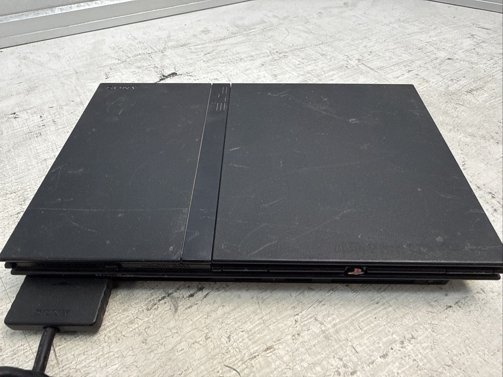 Sony PlayStation 2 Slim Console and Controller Only. Color may Vary.