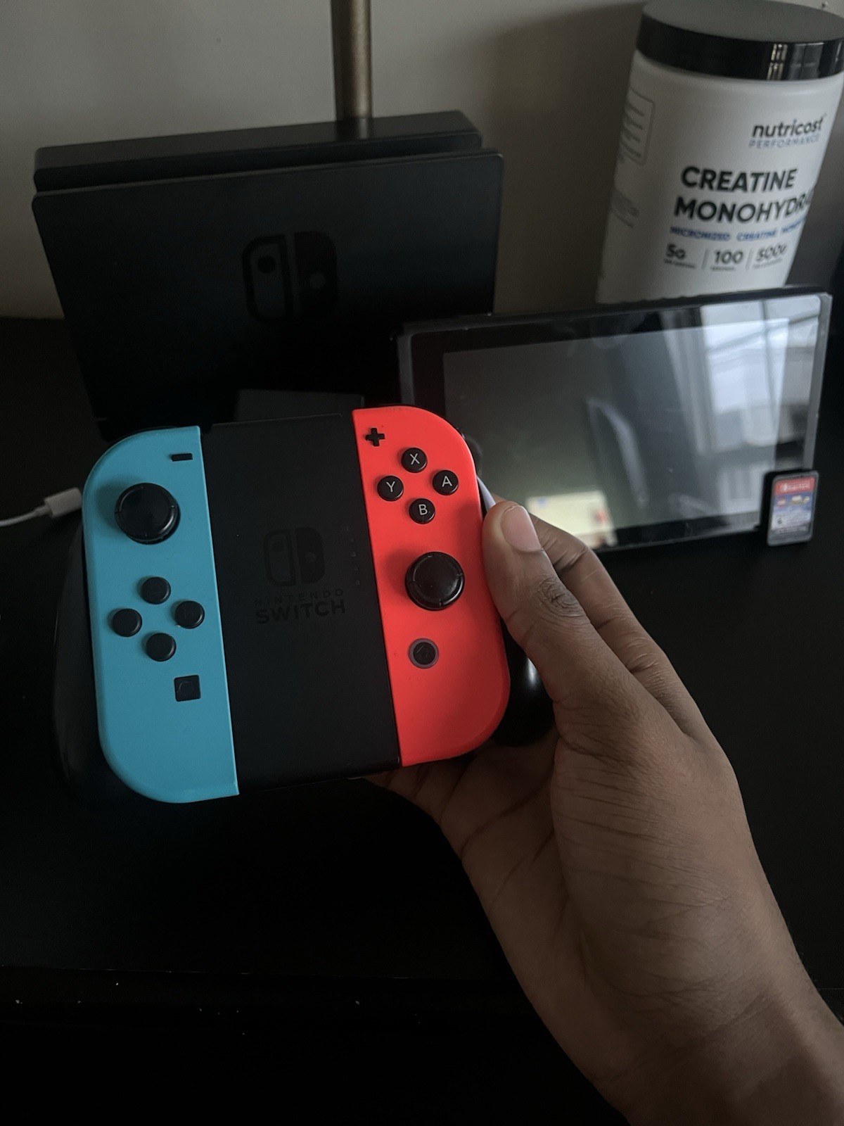 Nintendo Switch 32GB Handheld Console Neon Red/Neon Blue (Marvel game included)