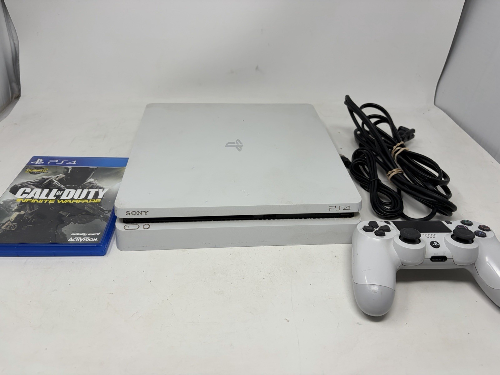 Sony PlayStation 4 Slim 500GB White Console Call of Duty Infinite Warfare Bundle