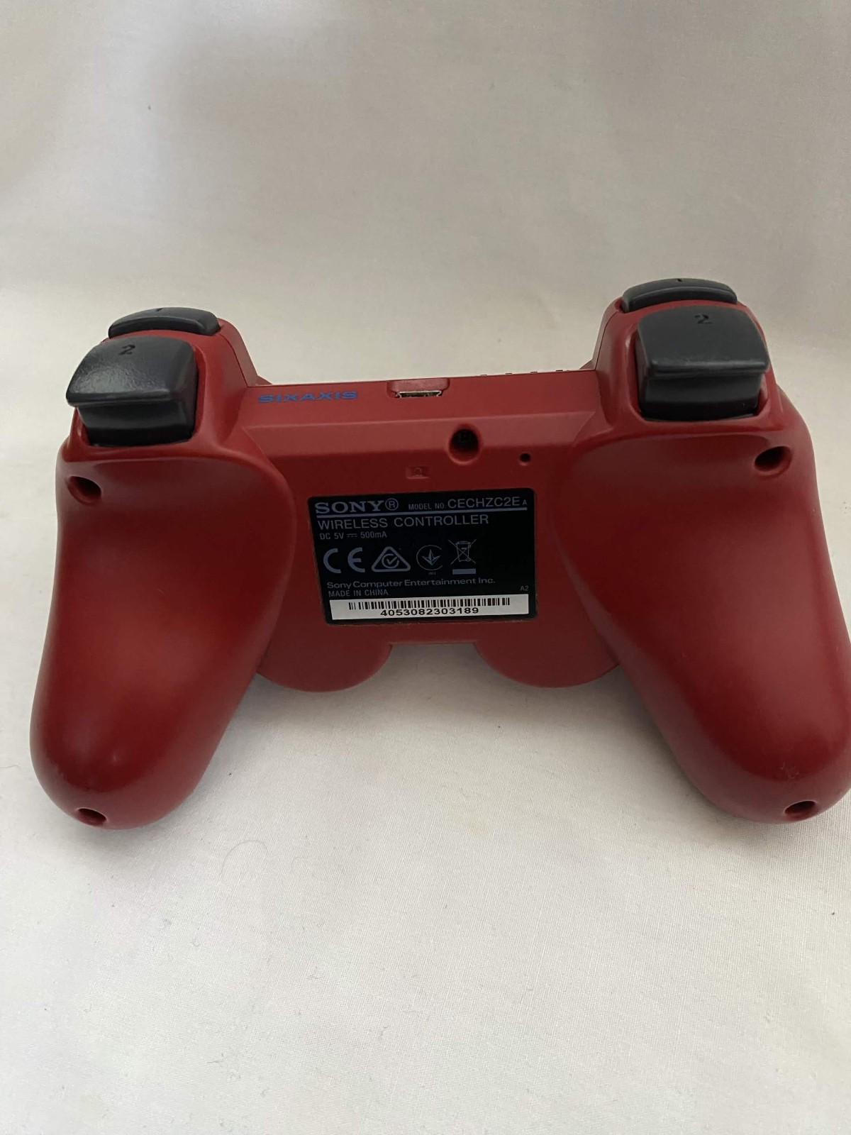 PlayStation 3 Red Super Slim Console CECH-4202A 12GB with 6 games & 2 controller
