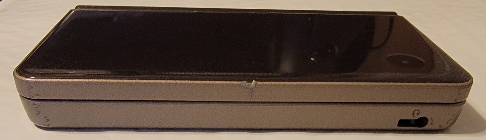 Nintendo DSi XL Bronze w/ Charger & 2 Games Mario 64 DS & New Super Mario Bros