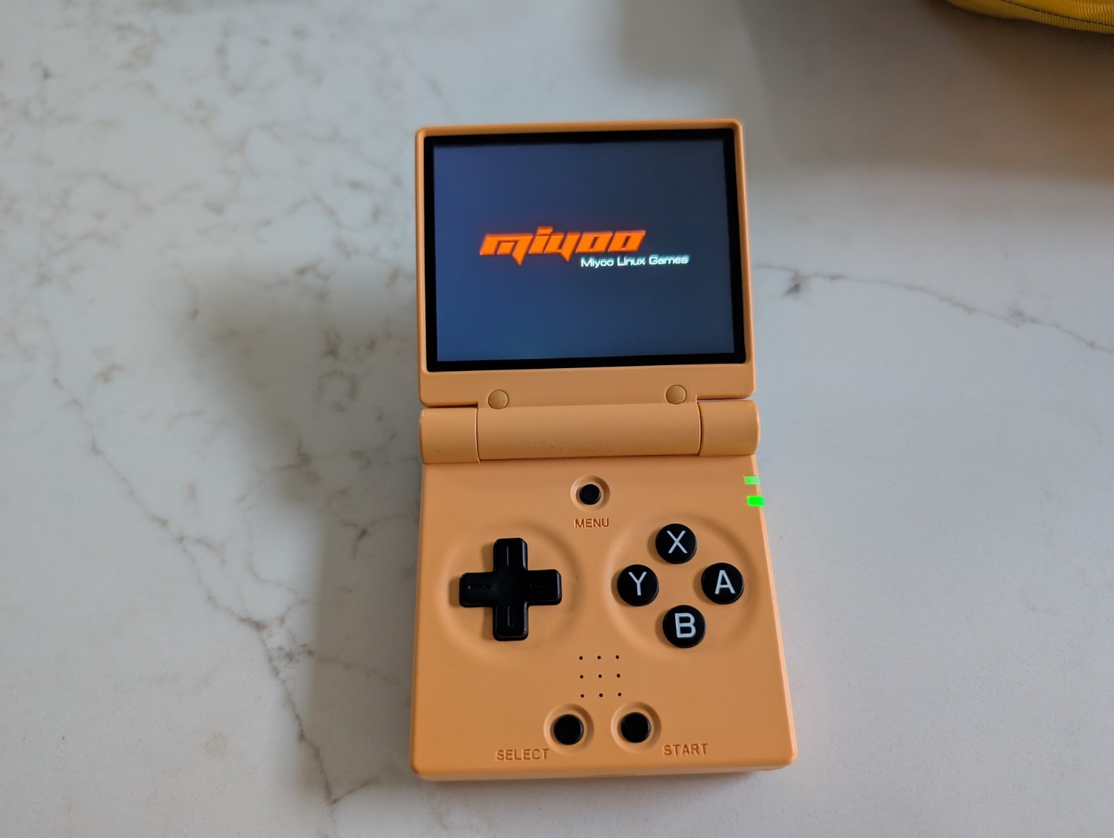 Yellow Miyoo Mini Flip Handheld, Original Case Included