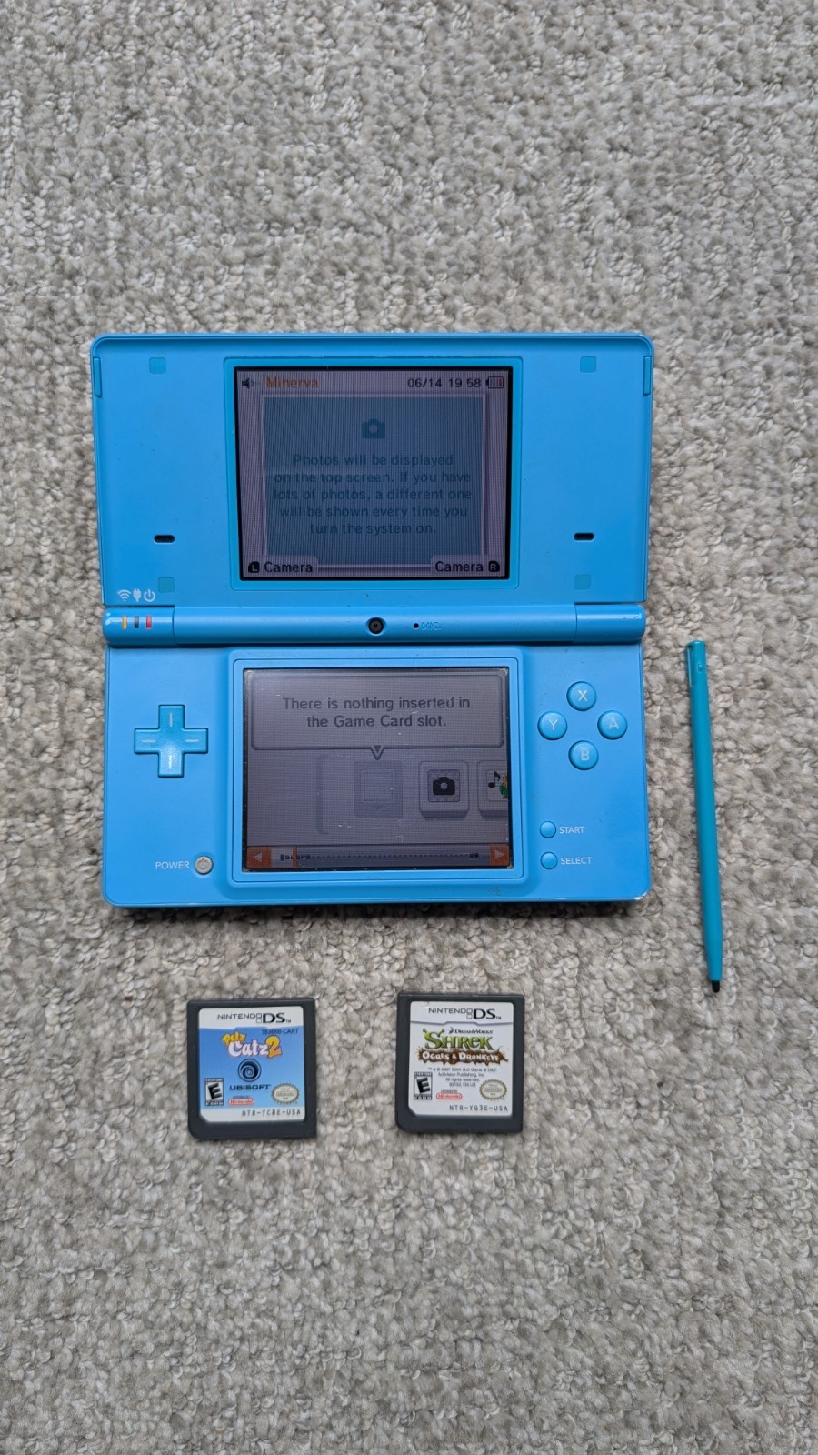 Nintendo DSi Light Blue Handheld Console Game System w/ Charger & 2 Games