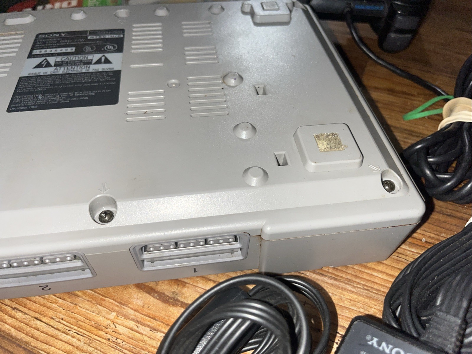 Sony Playstation 1 Gray Console With Games Controllers, A/V Cable, and Power