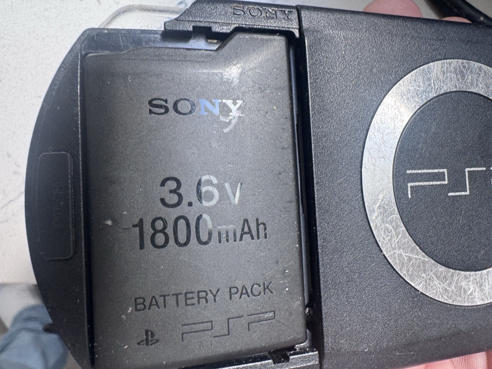 Sony PSP-1001 PlayStation Portable – Black With 8 Discs And Power Cord