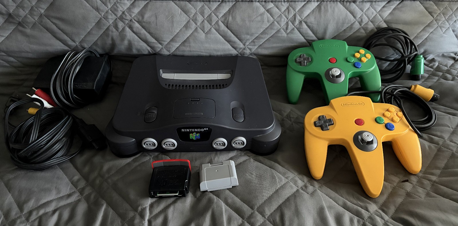 Nintendo 64 console bundle with Expansion Pak, two controllers, and Memory Pak.