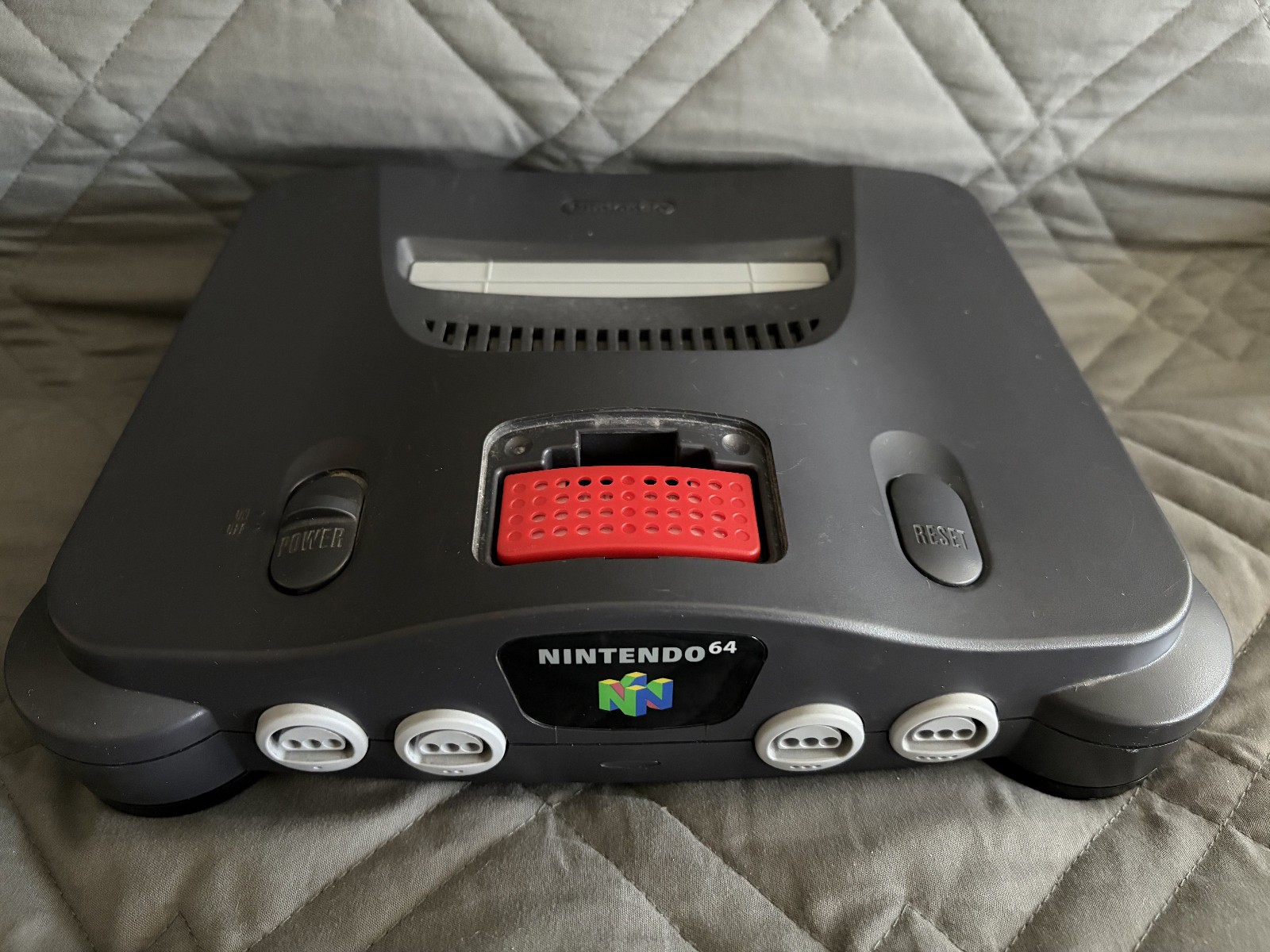 Nintendo 64 console bundle with Expansion Pak, two controllers, and Memory Pak.