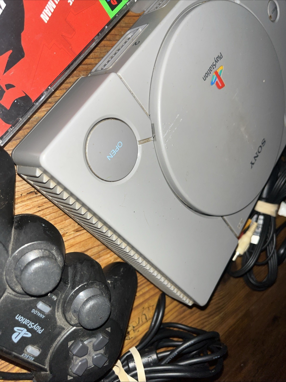 Sony Playstation 1 Gray Console With Games Controllers, A/V Cable, and Power