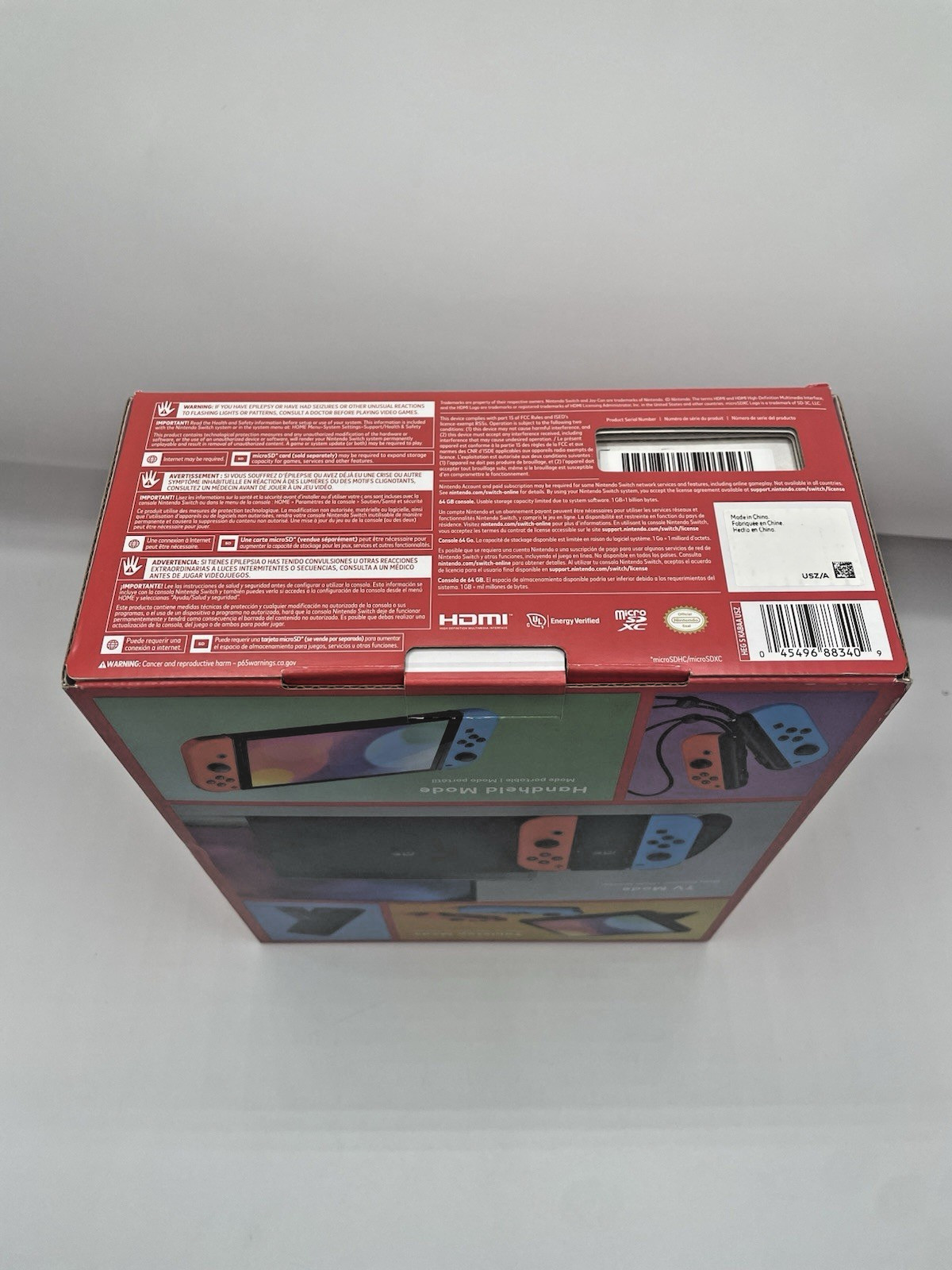 Nintendo Switch Console – OLED Model with Neon Red & Neon Blue Joy-Con Brand New