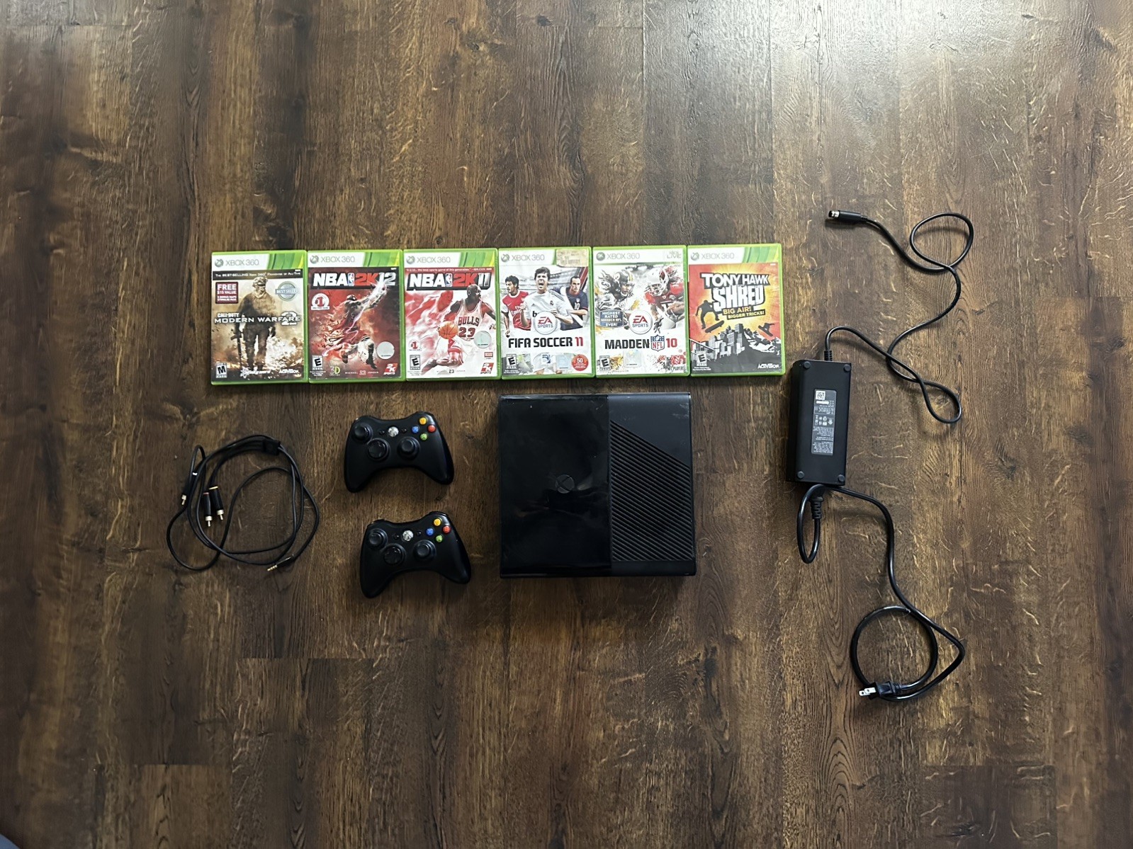 Xbox 360 E 250GB Console Bundle – 2 Controllers, Power Supply, and 6 Games