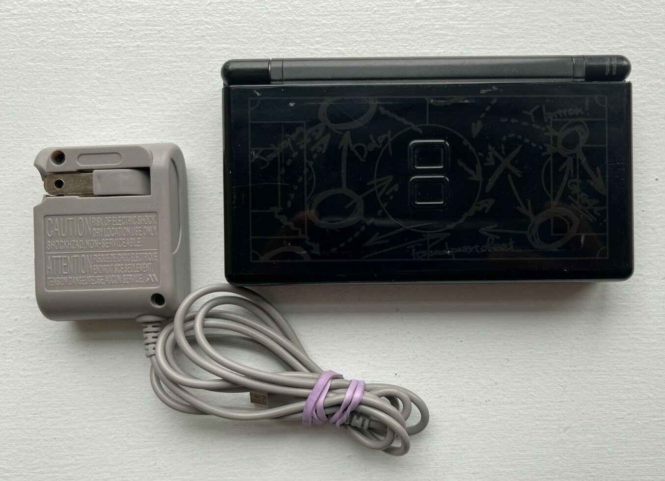 Nintendo DS Lite «Winning Eleven» Limited Edition with Wall Charger – VERY GOOD