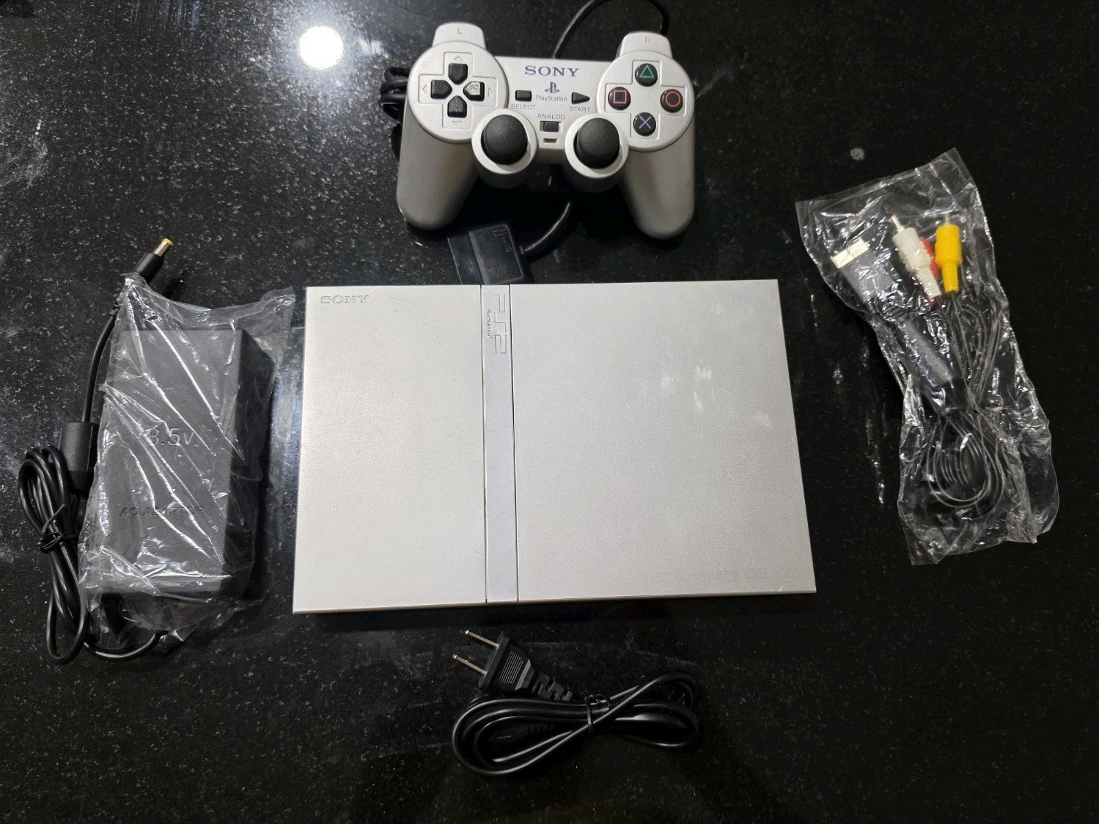 Sony PlayStation 2 PS2 Slim Silver Console Complete. Tested Working