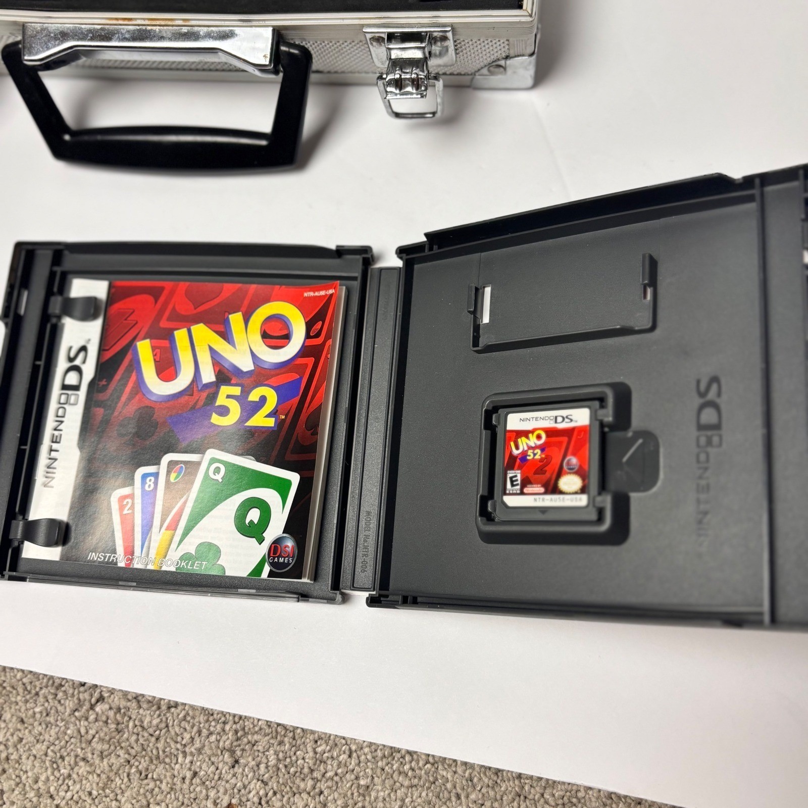 Nintendo DS Silver Handheld Console with Intec Aluminum Case Accessories & games