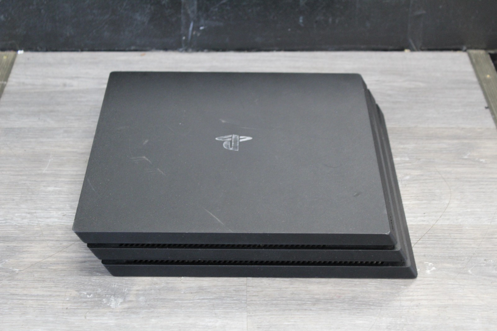 Sony PlayStation 4 Pro 1TB Game Console – Jet Black with Camo Controller