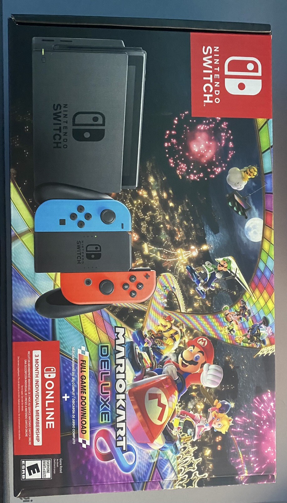 Nintendo Switch with Blue and Red Joy-Con Controllers and Mario Kart 8 Bundle –