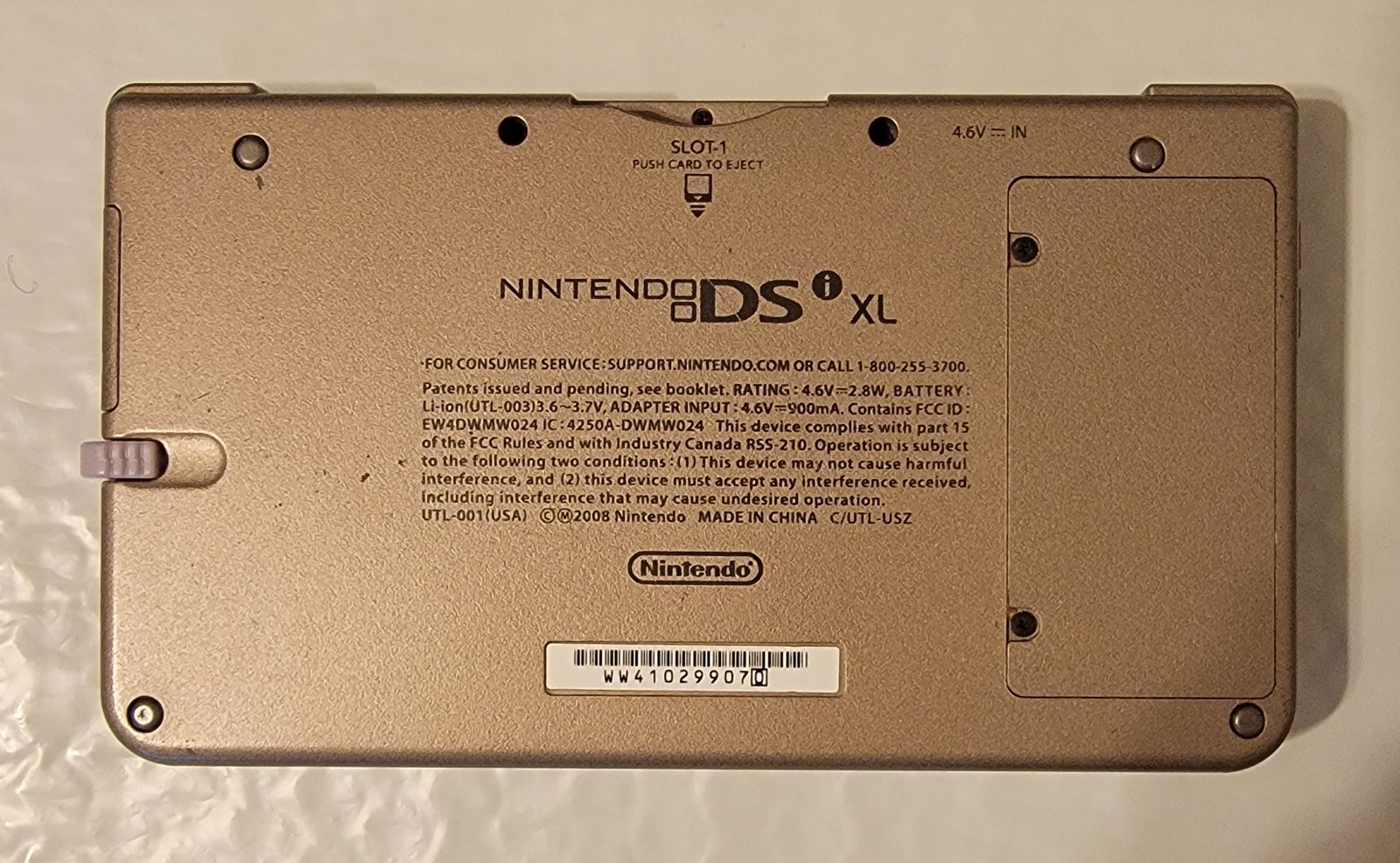 Nintendo DSi XL Bronze w/ Charger & 2 Games Mario 64 DS & New Super Mario Bros