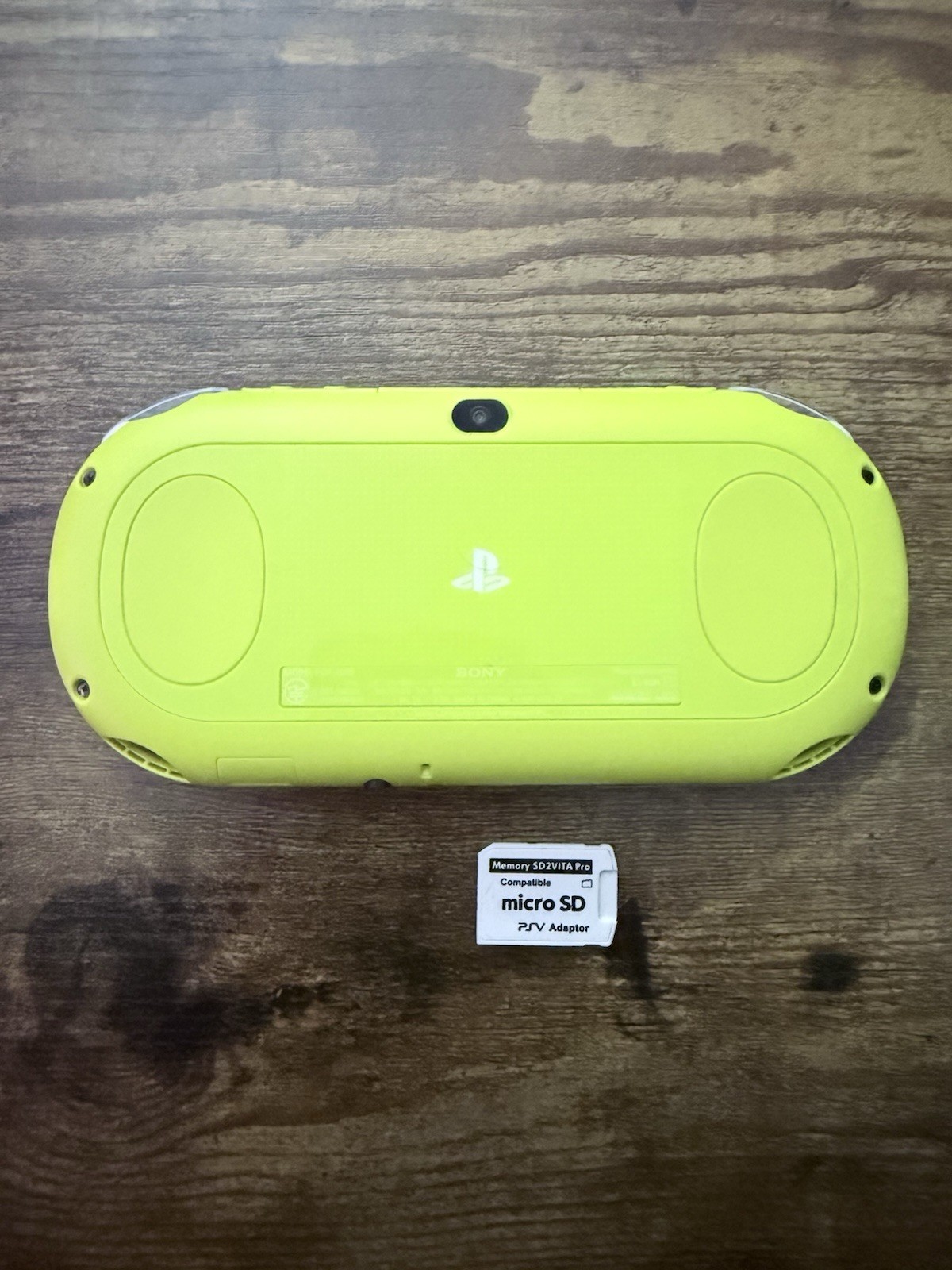 Sony PS Vita 2000 Handheld Console White/Yellow with Wi-Fi micro SD Adapter