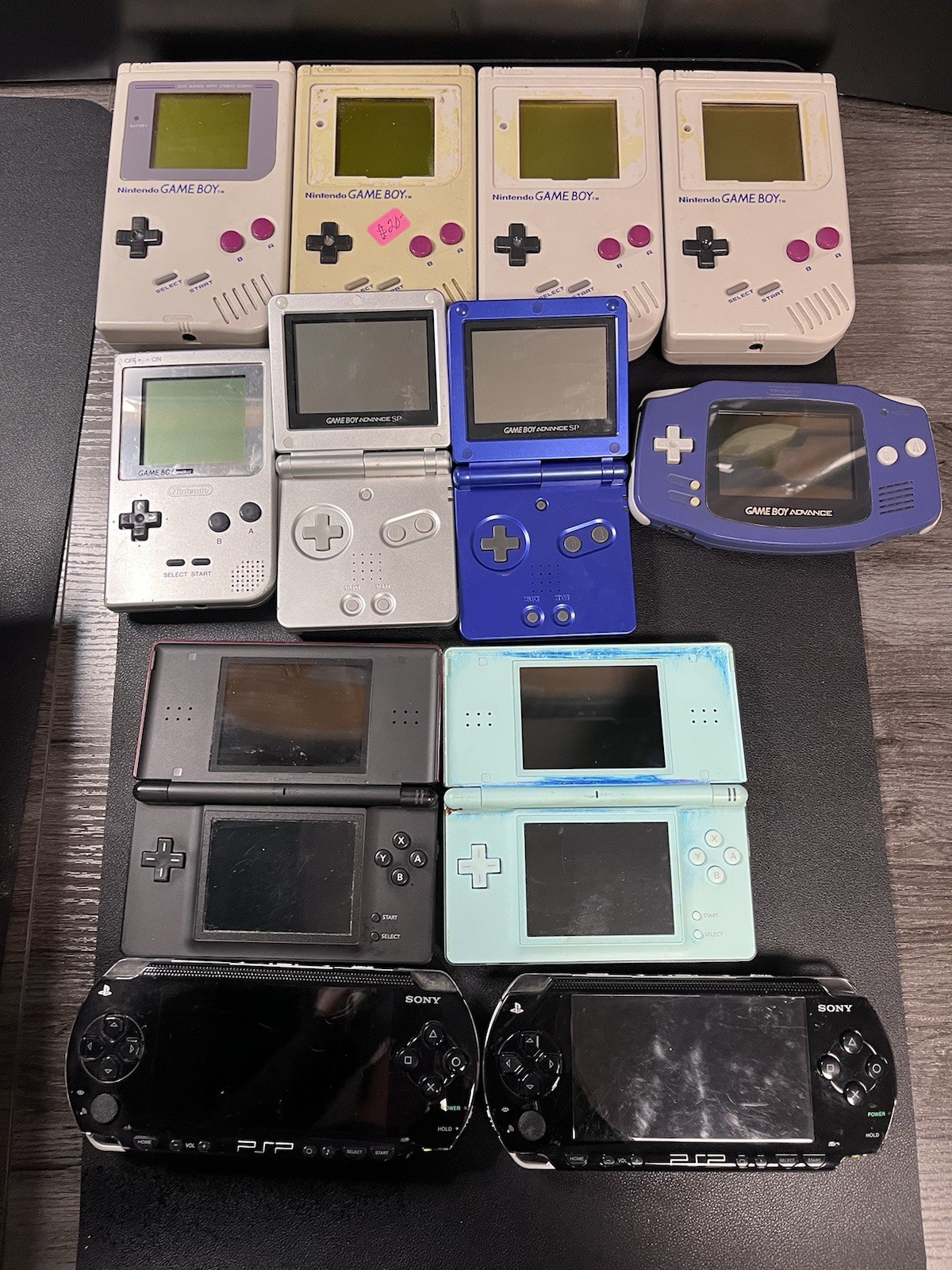 Lot Of NINTENDO,PSP FOR PARTS REPAIR ONLY 12 HAND HELD DEVICES Total