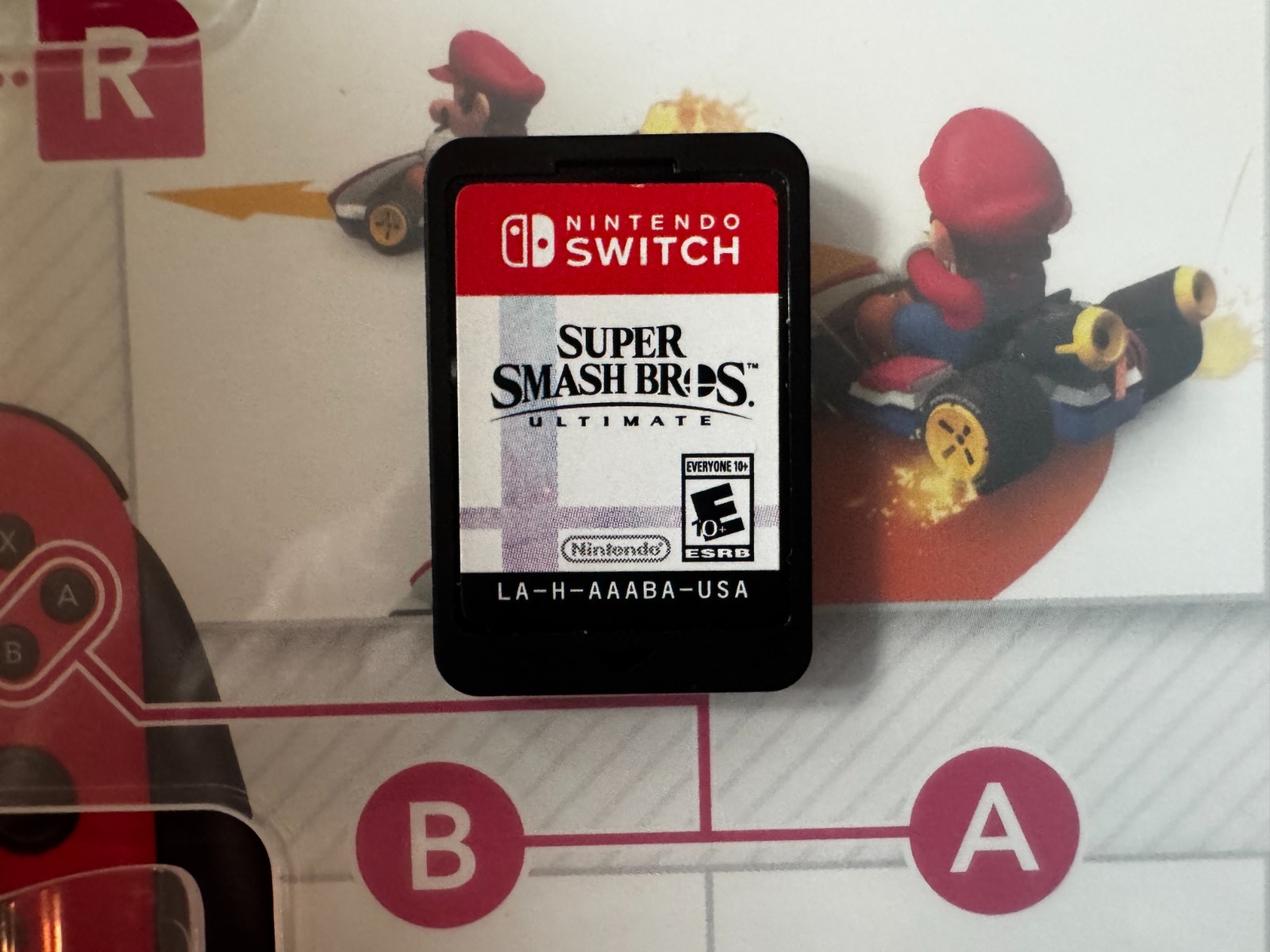 Nintendo Switch V1 Neon Blue/Red Console Bundle + Mario Kart 8 & Super Smash Bro