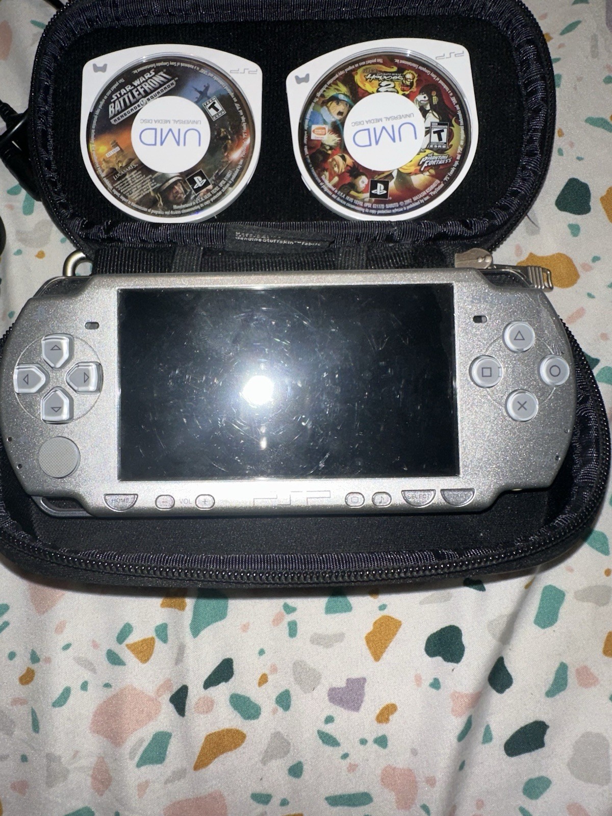 PSP 2001 Silver CONSOLE W/2 Games And Charger Tested