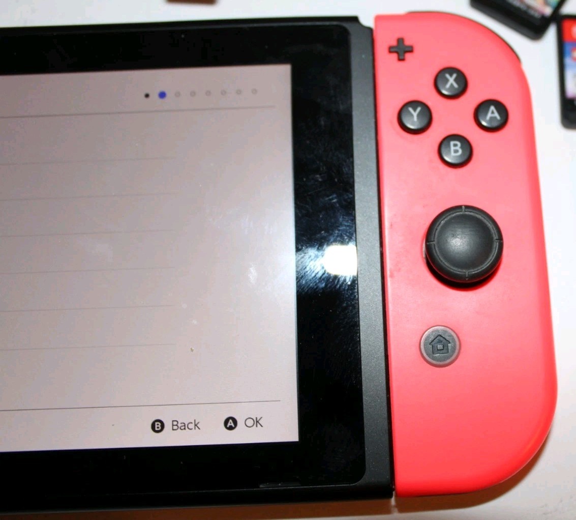 Nintendo Switch Console Model HAC-001(01) Bundle w/ 3 Games, Carrying Case, Extr