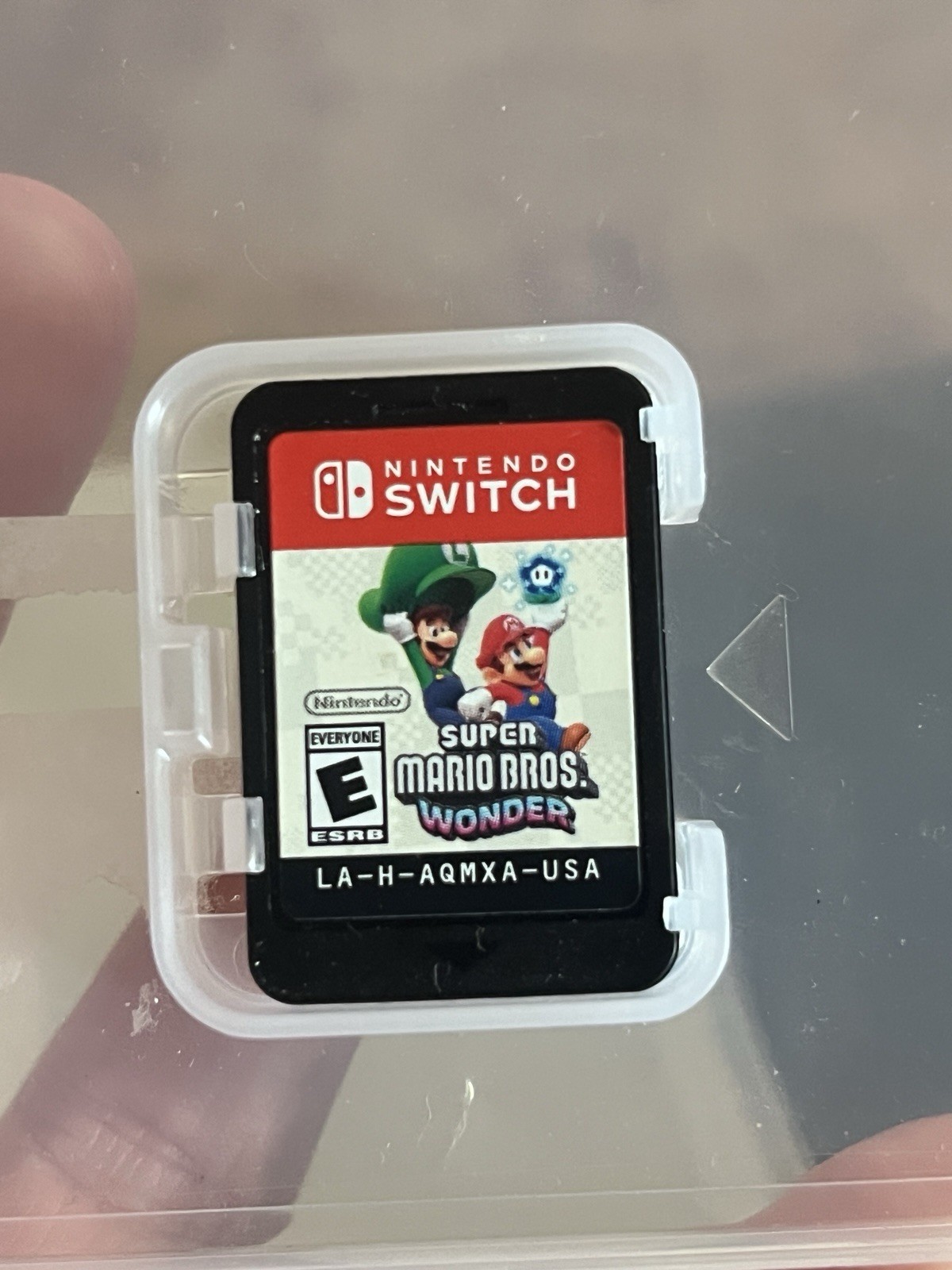 Nintendo Switch White Joy-Con Controller, Charger, With Three Mario Game Bundle