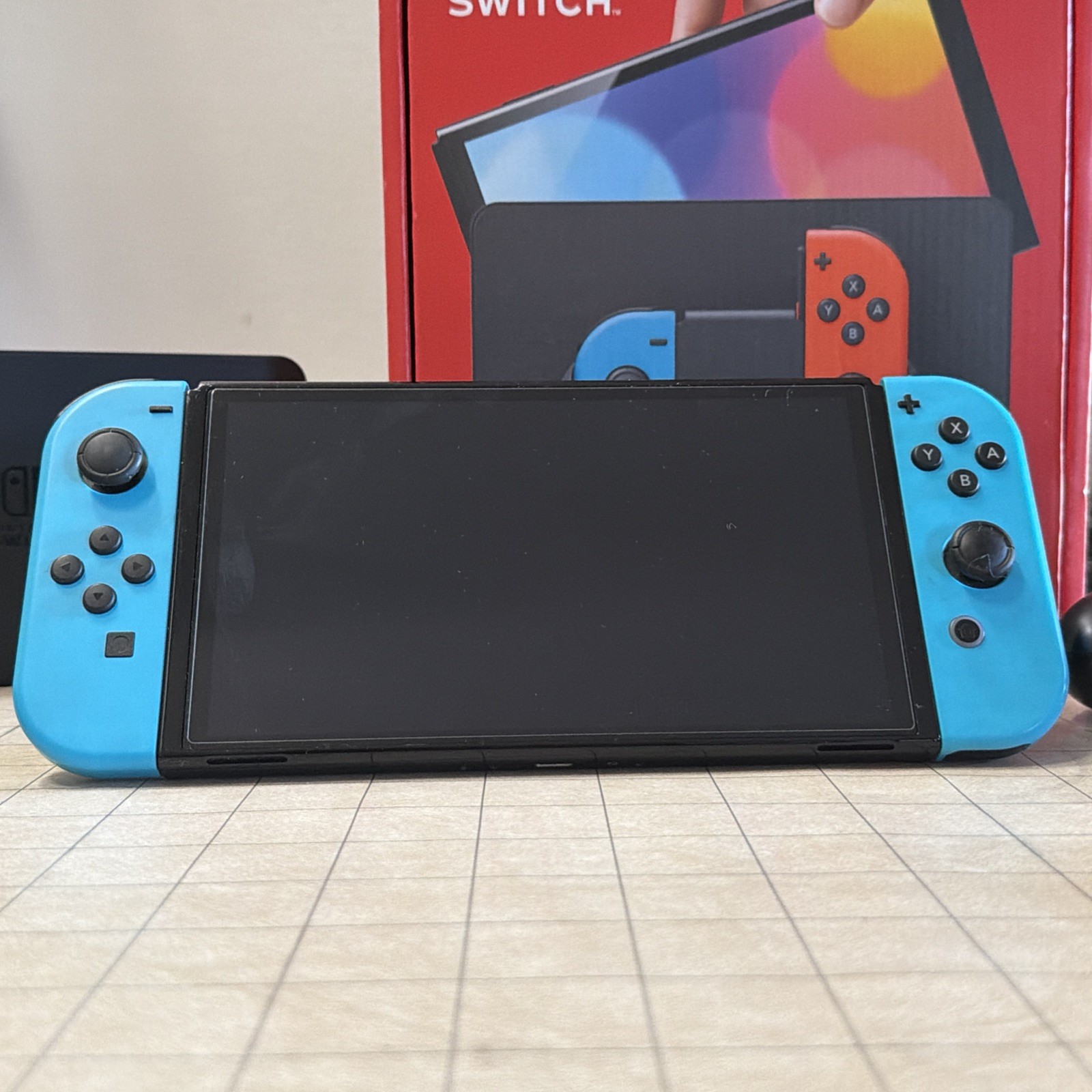 Nintendo Switch OLED Model HEG-001 Handheld Console – 64GB – Black/Neon Red/Neon