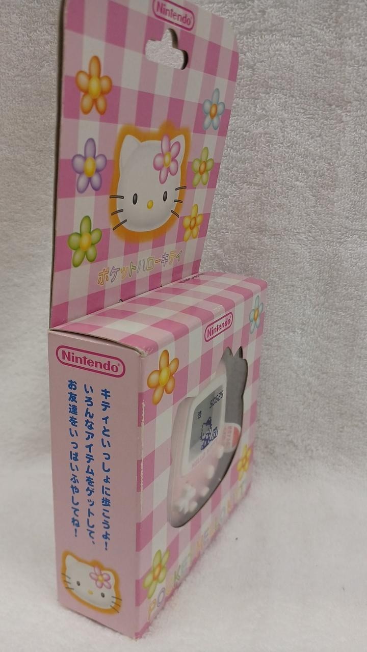 Nintendo Pocket Hello Kitty MPG-001 Unused Virtual Pet Game A2682