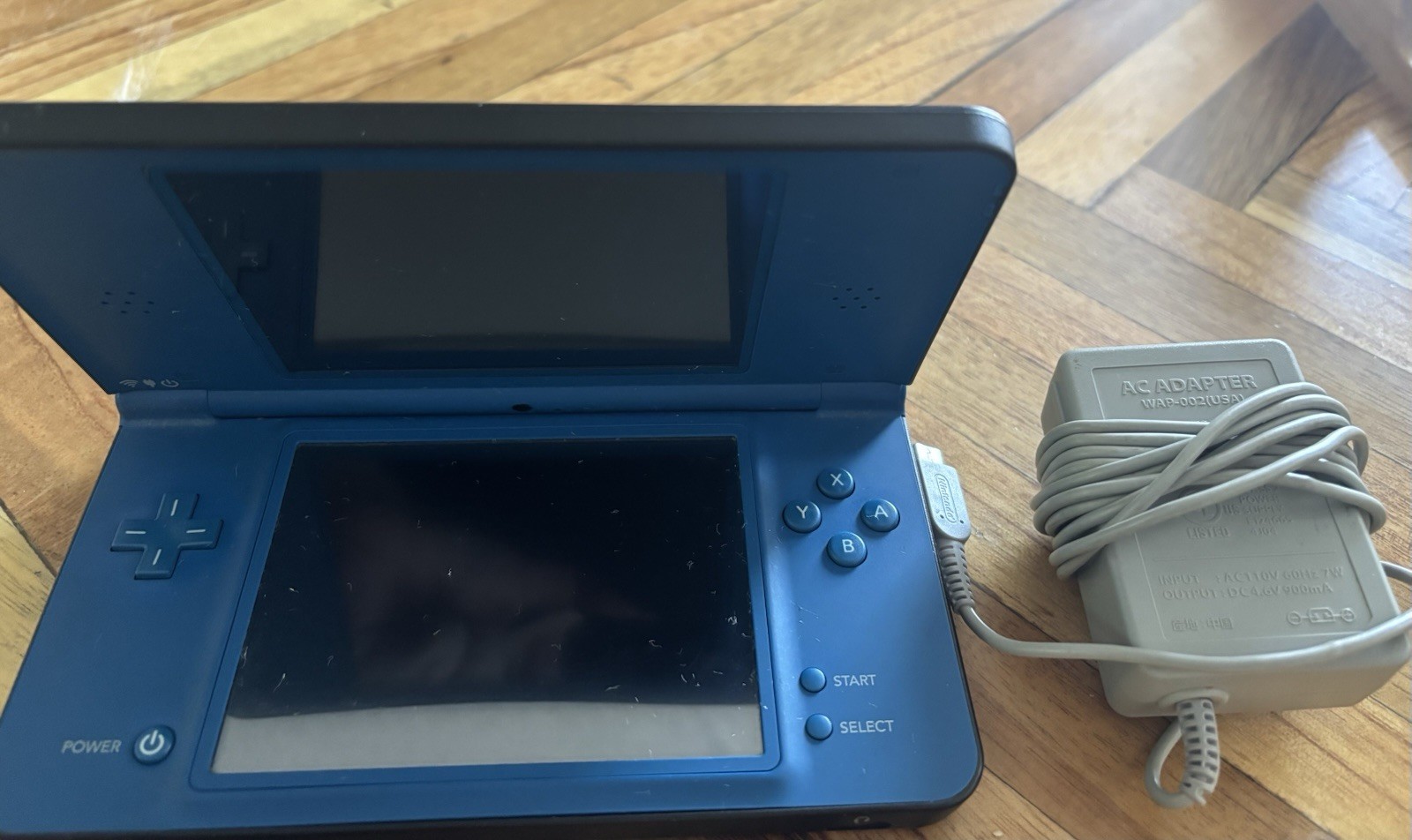 Nintendo DSi XL Blue Handheld System Touchscreen 256MB w/ AC Adapter