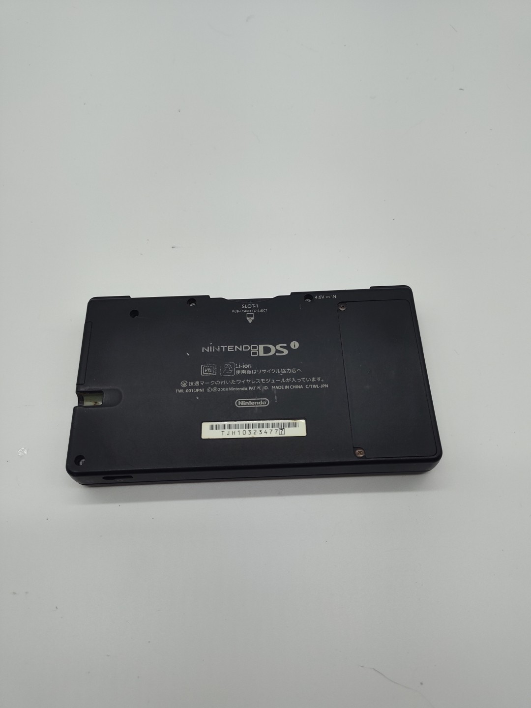 Nintendo DSi Game Console Only No Stylus TESTED AND WORKING/ Has Yellowed Screen