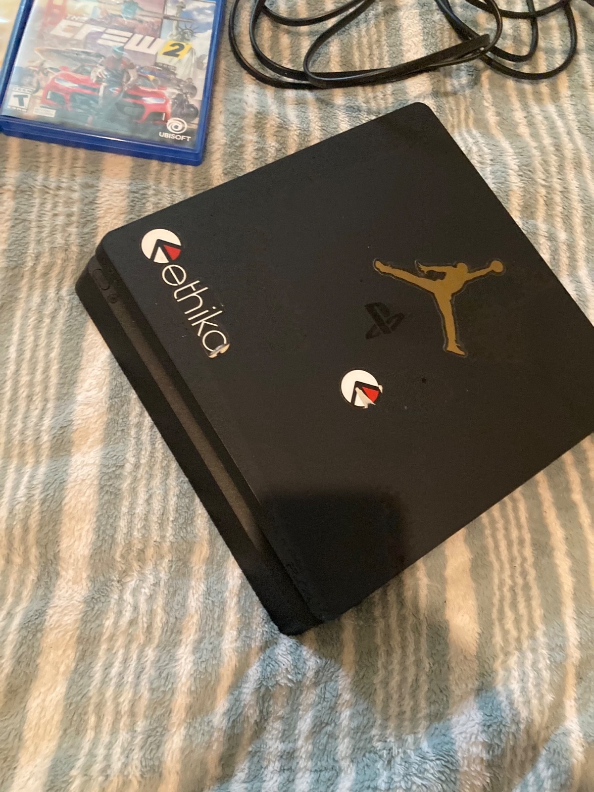 Sony PlayStation 4 Slim with two controllers and 6 games