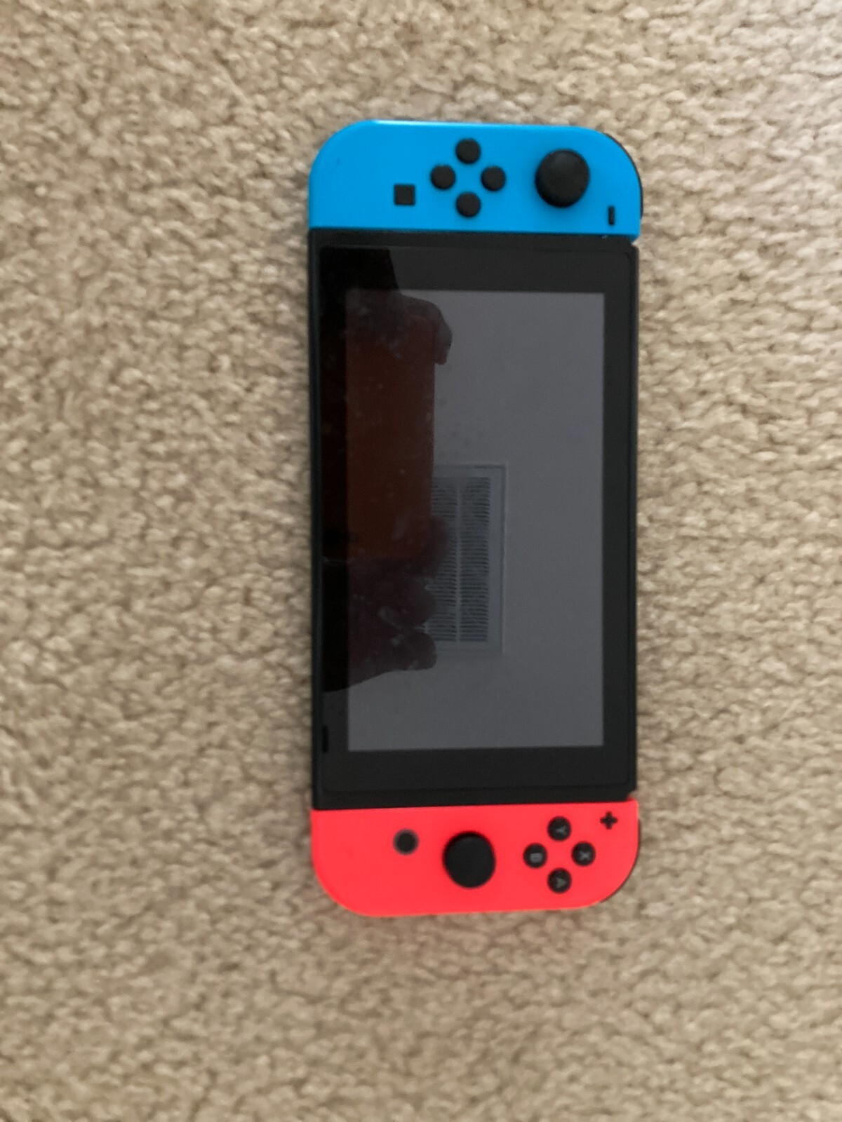 Nintendo switch – Red/Blue Controller. Includes 128GB MicroSD and 3 Games