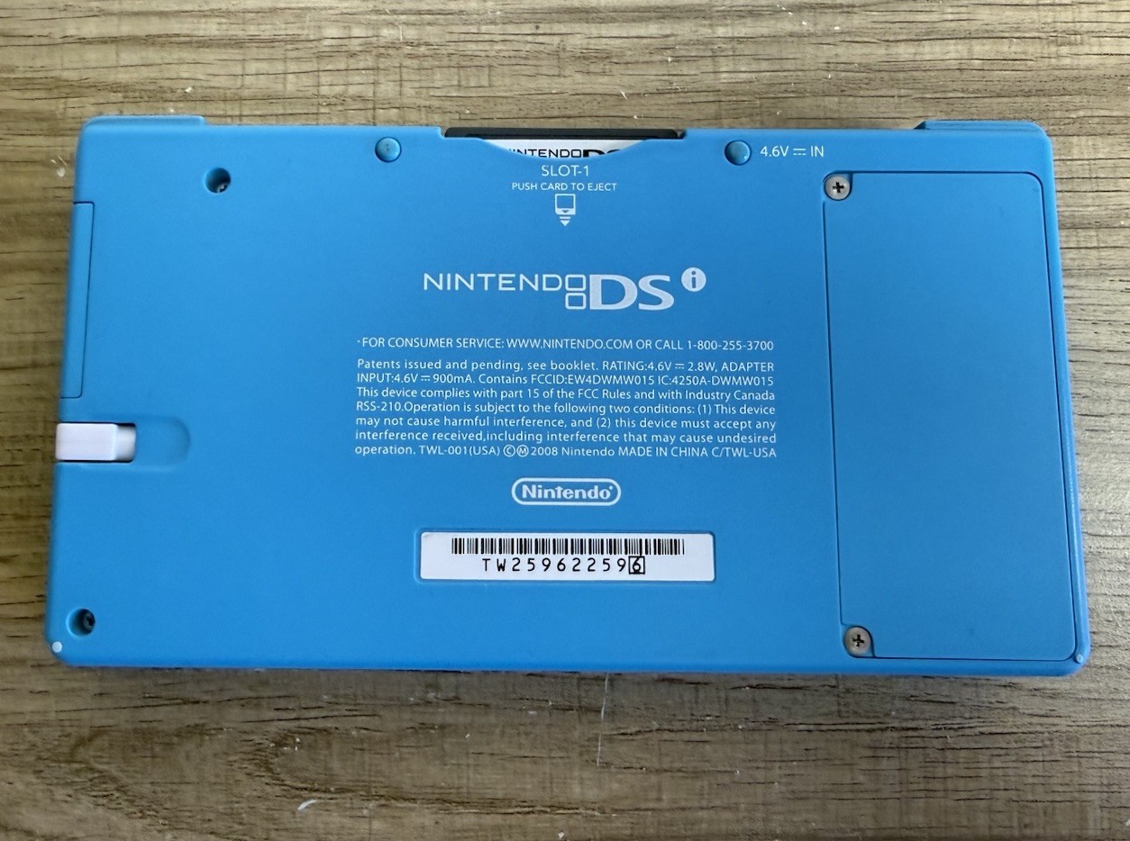 Nintendo DSi Aqua Blue Handheld Console w/ Stylus Iron Man2 Charger Tested Works